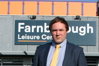 Cllr Thomas Mitchell in front of Farnborough Leisure Centre